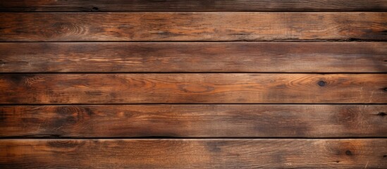 Obraz premium An aged wooden surface provides a rustic background for a copy space image