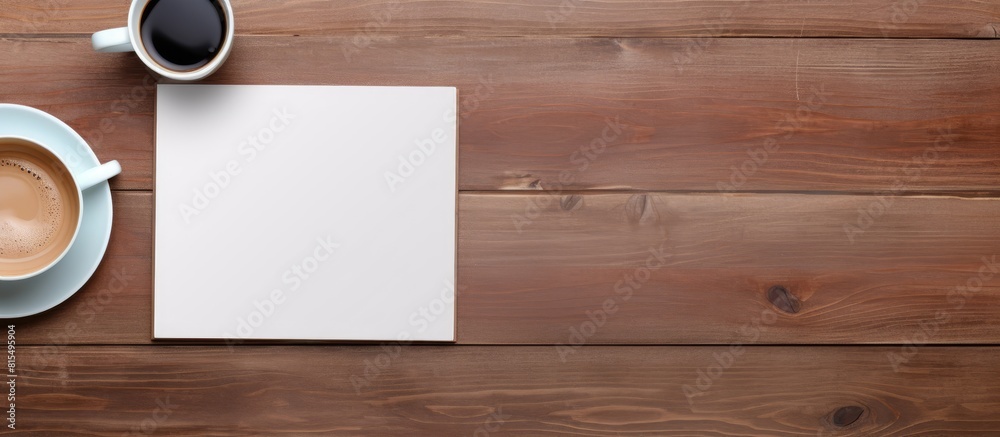 Aufkleber There is a top down view of a wooden work table with a notepad a computer and a coffee cup placed on it creating enough space for additional content in the image