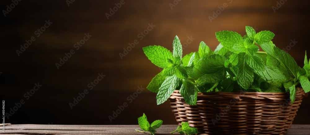 Aufkleber A basket filled with fresh green mint stands on a wooden background creating a visually appealing copy space image