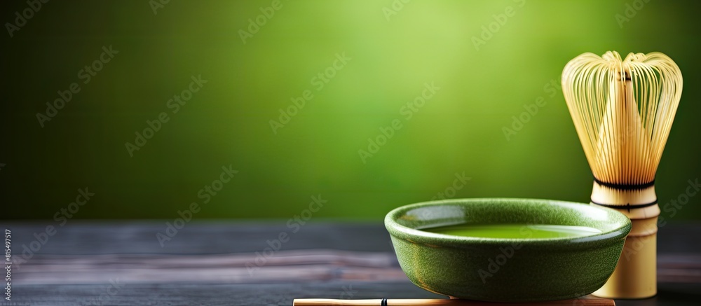 Poster A bowl of Matcha tea is accompanied by a bamboo whisk with ample copy space available