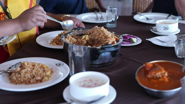 Eating Chinese food in the Restaurant