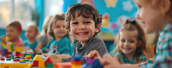 Happy child playing with colorful toy blocks among friends in a vibrant classroom.