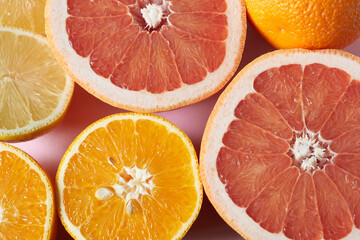 Various types of citrus fruits, including lemons, grapefruit and oranges. A background of citrus...