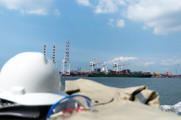 Engineer are working on container shipping port at night.