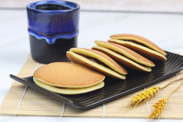 Dorayaki, Japanese popular soft pancakes filled with chocolate jam or red bean paste. 