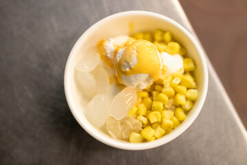 Coconut milk ice cream with egg yolk and topping; Thai dessert style.