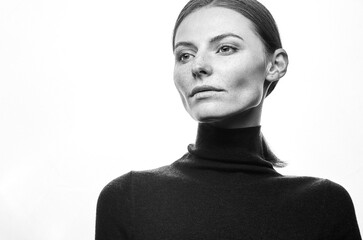 Studio portrait of a sexy girl with smoothed hair. Grain effect used