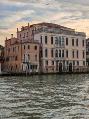 Naklejka premium Buildings in Gran Canal, during sunrise