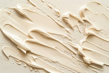 Abstract background with different shades of cream texture on beige surface