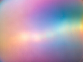 Obraz premium Shimmering iridescent soap bubble texture delicate pastel rainbow hues soft focus hazy ethereal glow bright