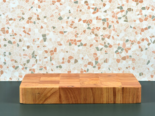 A sturdy wooden pedestal, perfect for product placement, set against a stylish mosaic background