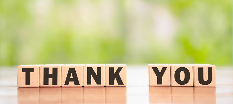 thank you business. block wood showing the message thank you on a display screen. concept of appreciation and gratitude, congratulations, presentation from technology digital