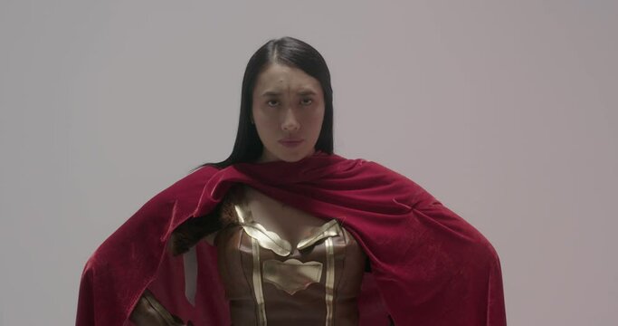 Profile shot of superwoman in Xena hero suit