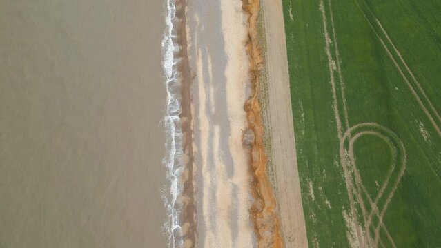 Top view of vacant Kessingland Beach during daytime in Suffolk, England. Drone shot.
