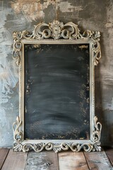 Vintage ornate frame with blank blackboard texture