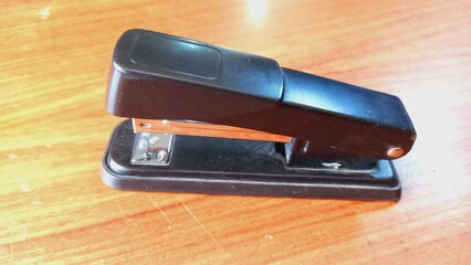 Black stapler photo with an isolated white background