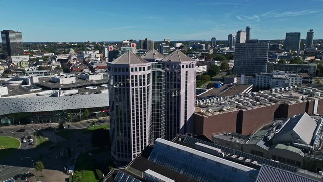 Aerial drone view of Weststadt Towers (Weststadtt&uuml;rme), a triplex modern skyscraper near the Colosseum Theater in Berliner Platz, Essen, Germany. 