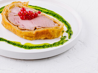 Gourmet pork tenderloin with redcurrant and pesto