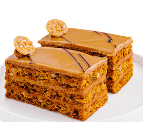 Gourmet peanut butter cake slices on white plate