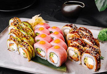 Assorted sushi platter on modern plate