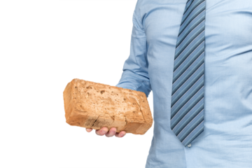 A man in a blue shirt and tie holds an orange brick in his hand, his face is not visible, isolated on a transparent background png