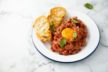 Steak tartare with gherkins