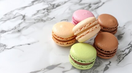 Obraz premium French dessert macarons on a white marble surface