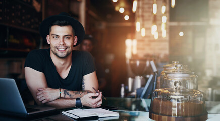 Laptop, man and coffee shop portrait with writer and freelancer working on article or blog. Smile, restaurant and tech with copywriting and morning with remote job at cafe with internet and notebook