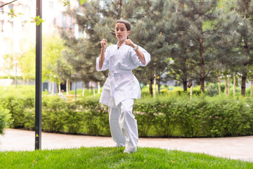 Girl in Karate Taekwondo Fighting Stance