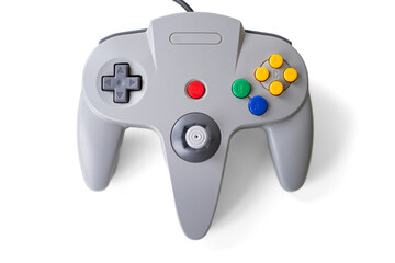 Vintage gray controller on a white background. Perfect for retro gaming enthusiasts and collectors...