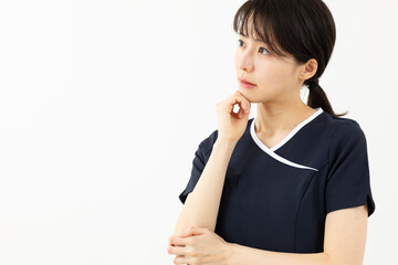 Obraz premium 考える美容スタッフ01