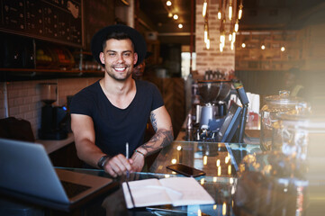 Laptop, man and coffee shop portrait with copywriter and freelancer working on article or blog....