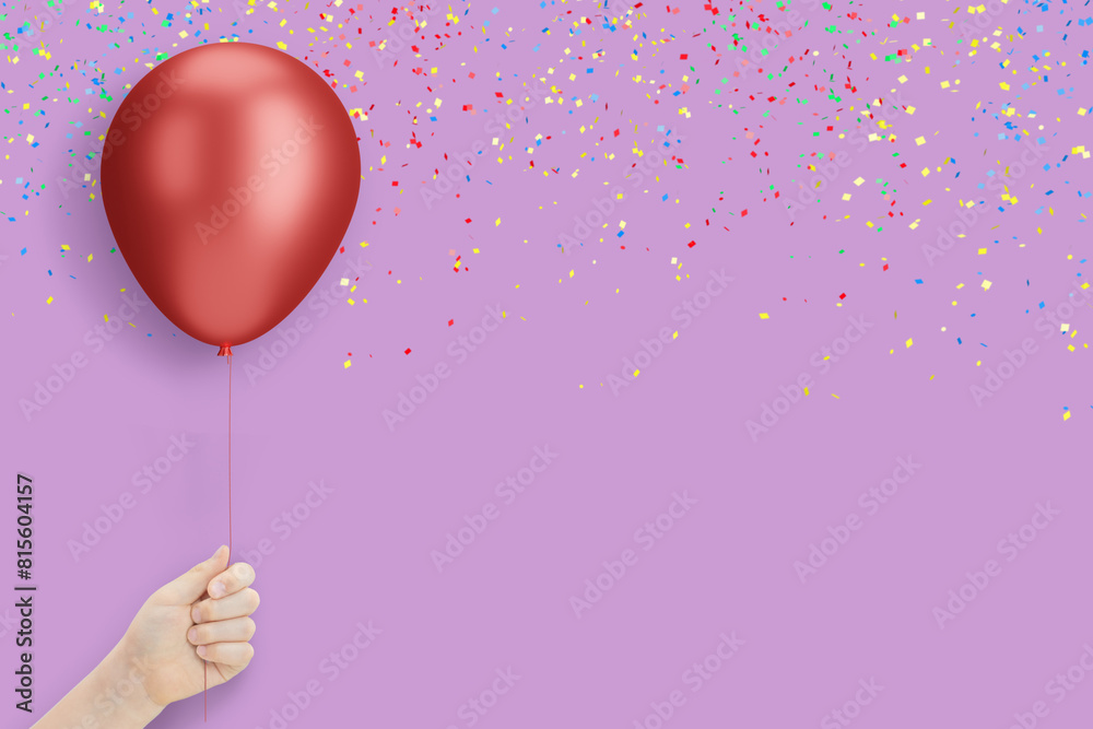 Poster female hand holding the red balloon on violet background with confetti. empty space for text