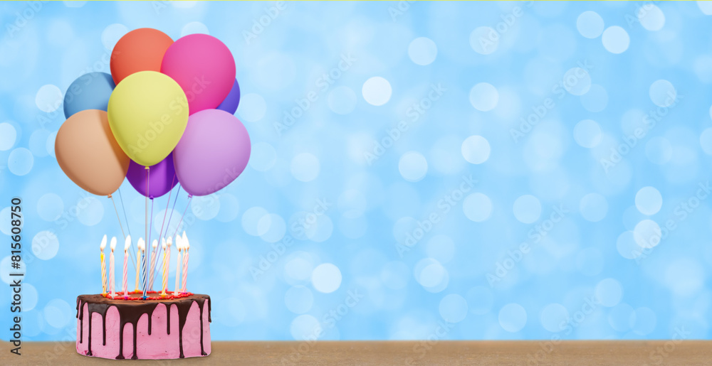 Poster birthday cake with bunch of colorful balloons on blurred blue or green background. empty space for t