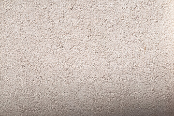 White wall texture. Selective focus. Plastered, rough wall.  Abstract concrete. Top view. 