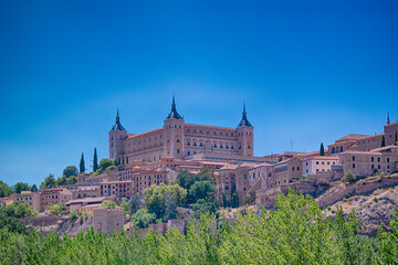 Fototapeta na wymiar Spanish Traveling Ideas. Scenic Panoramic View of Alcazar of Toledo City in Spain as UNESCO World Heritage