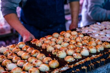 Elicious handmade pancake ball dessert at a food stall in Tokyo Japan.