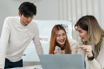 team of UI UX web designer are working together to develop mobile responsive websites with UI UX...