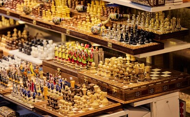Selection of chess pieces are displayed together on shelves in Grand Bazar in Istanbul, Turkey