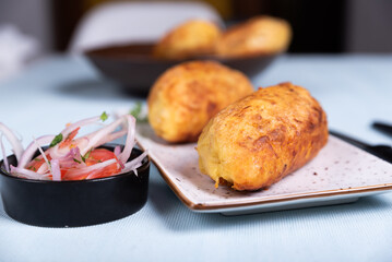 Crispy potato topping that exposes a delicious Peruvian filling.