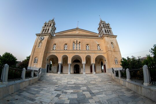 Majestic and grand cathedral with towering columns and a majestic clock tower