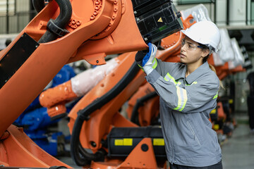 Industrial engineer working on robot maintenance in AI futuristic electronic technology factory....