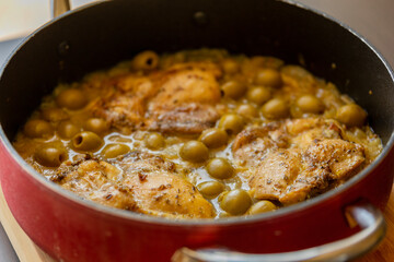 Delicious Mediterranean Chicken Thighs with Lemon and Green Olives Close Up 