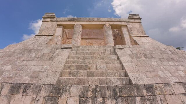 Ascending footage of the Temple of The Bearded Man in the Chichen Itza archeological site, Mexico