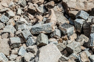 Pile of old paving stones, as a wallpaper