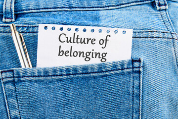 Culture of belonging symbol on a piece of paper that appeared from the pocket of jeans