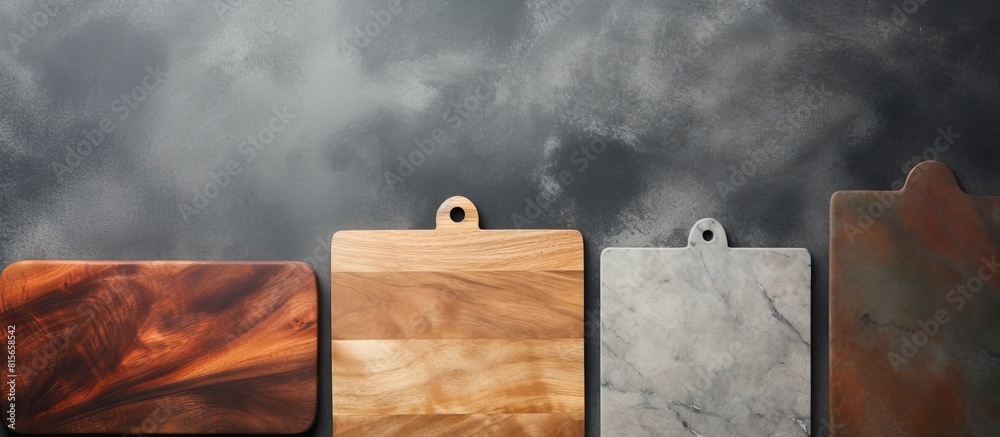 Aufkleber Aged wood cutting board set top view flat lay with copy space for text or your product on gray stone table background