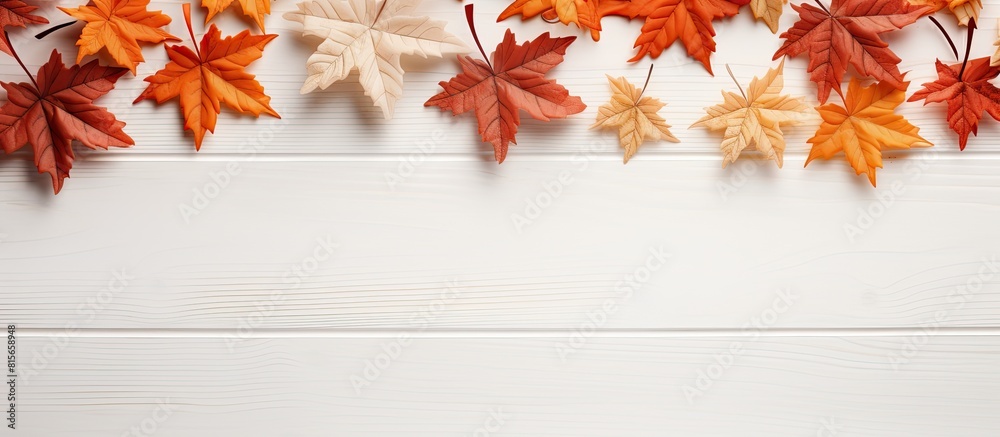 Poster wooden white background with copy space image featuring dry autumn maple leaves positioned in the up