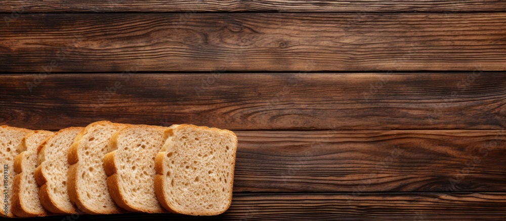 Poster Sliced bread on wooden table Top view with space for text or recipe. copy space available