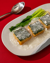 Vegetable tofu drizzled with egg sauce